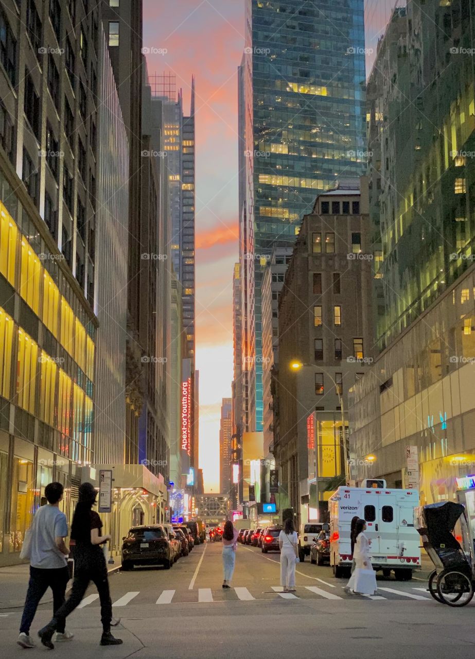 People crossing and walking in Times Square New York