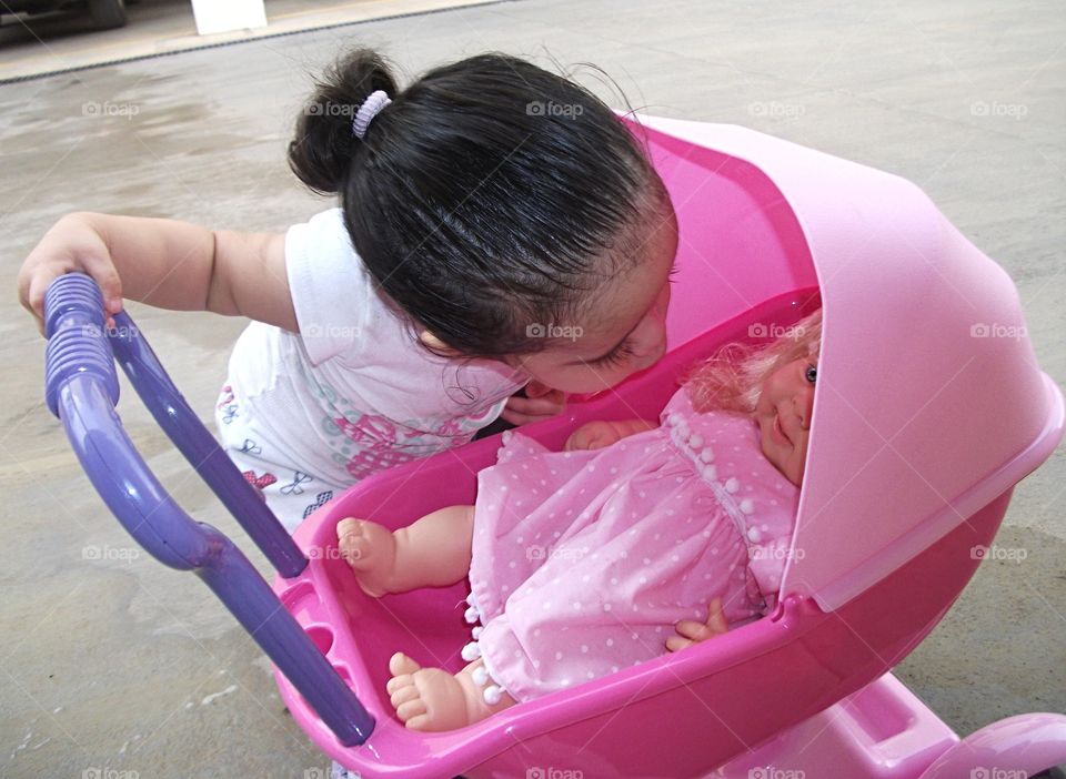 Child with doll cart