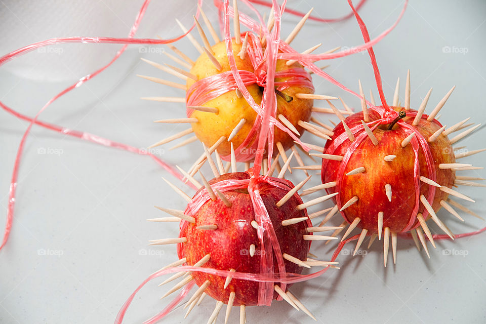 Close-up of apples with toothpick