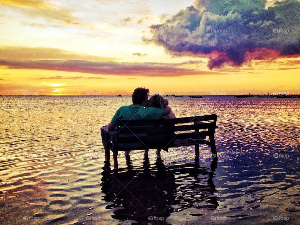 Loving couple enjoying sunset