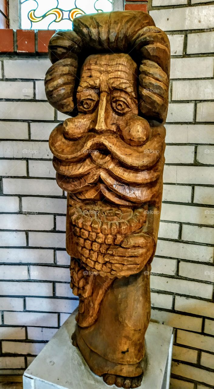 A hobby that has become a profession. Wooden sculpture and wood carving. Elemental king. (From the series “Visiting the Sculptor Chesnulis”, July, 2019) .