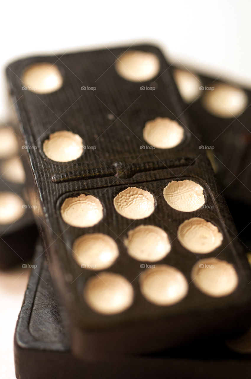 Macro Black Domino with White Dots