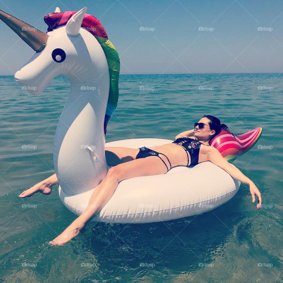Floating in the Greek sea on a unicorn