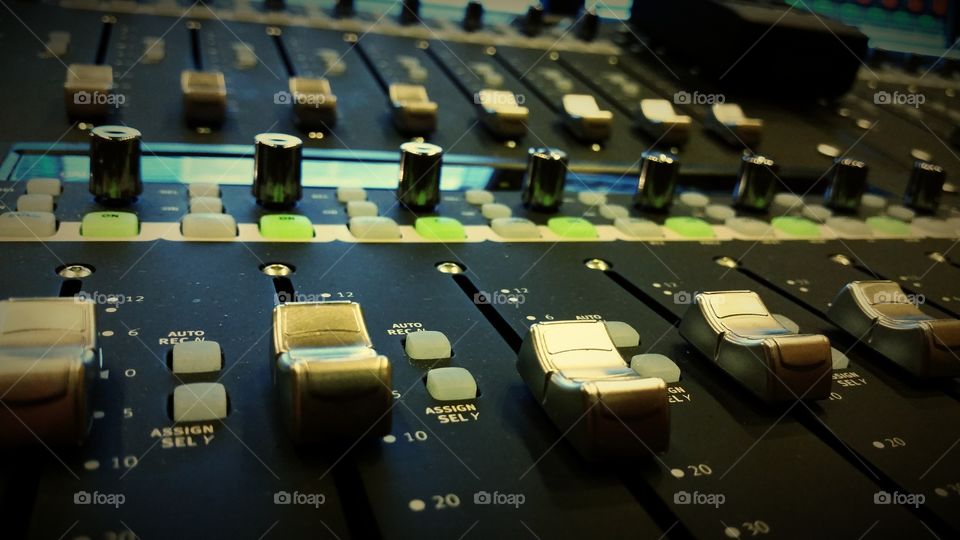 Sound mixer in the audio studio 