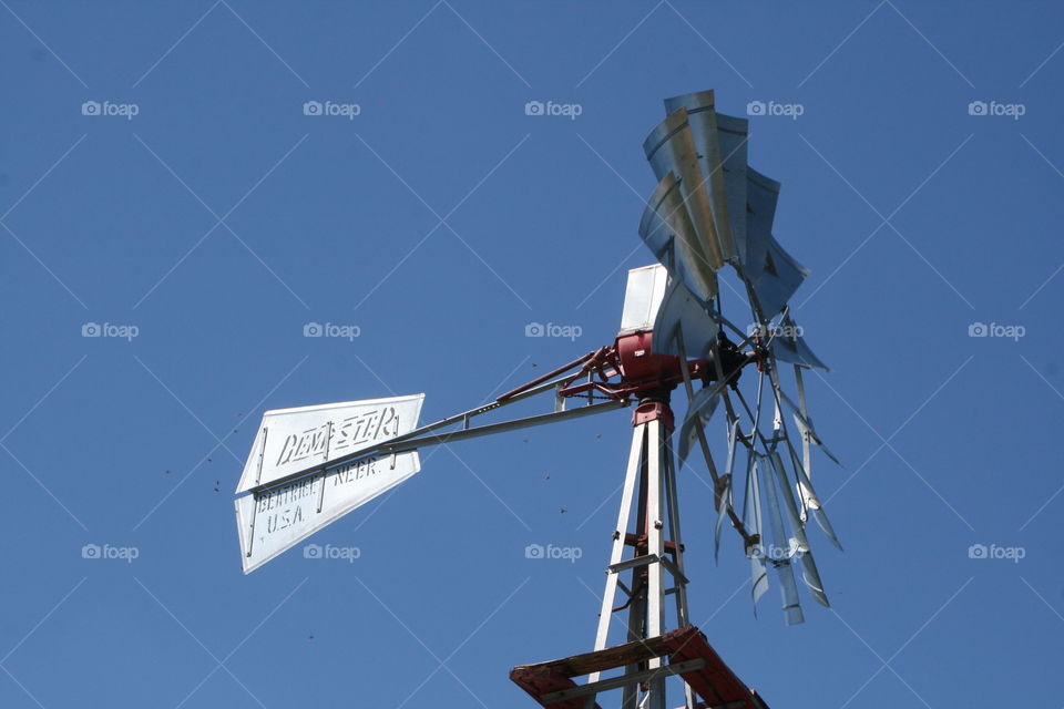 Windmill in the Sky. Looking up at a windmill. 