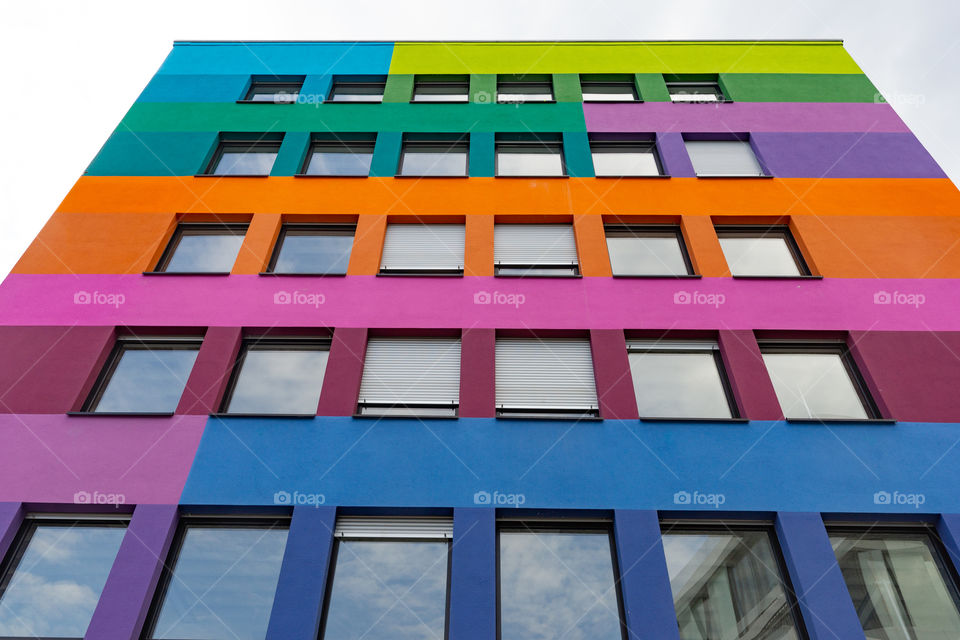 front of a colorful house