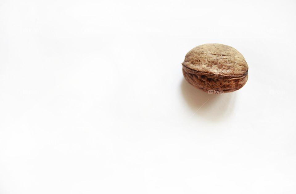 A walnut on a white background