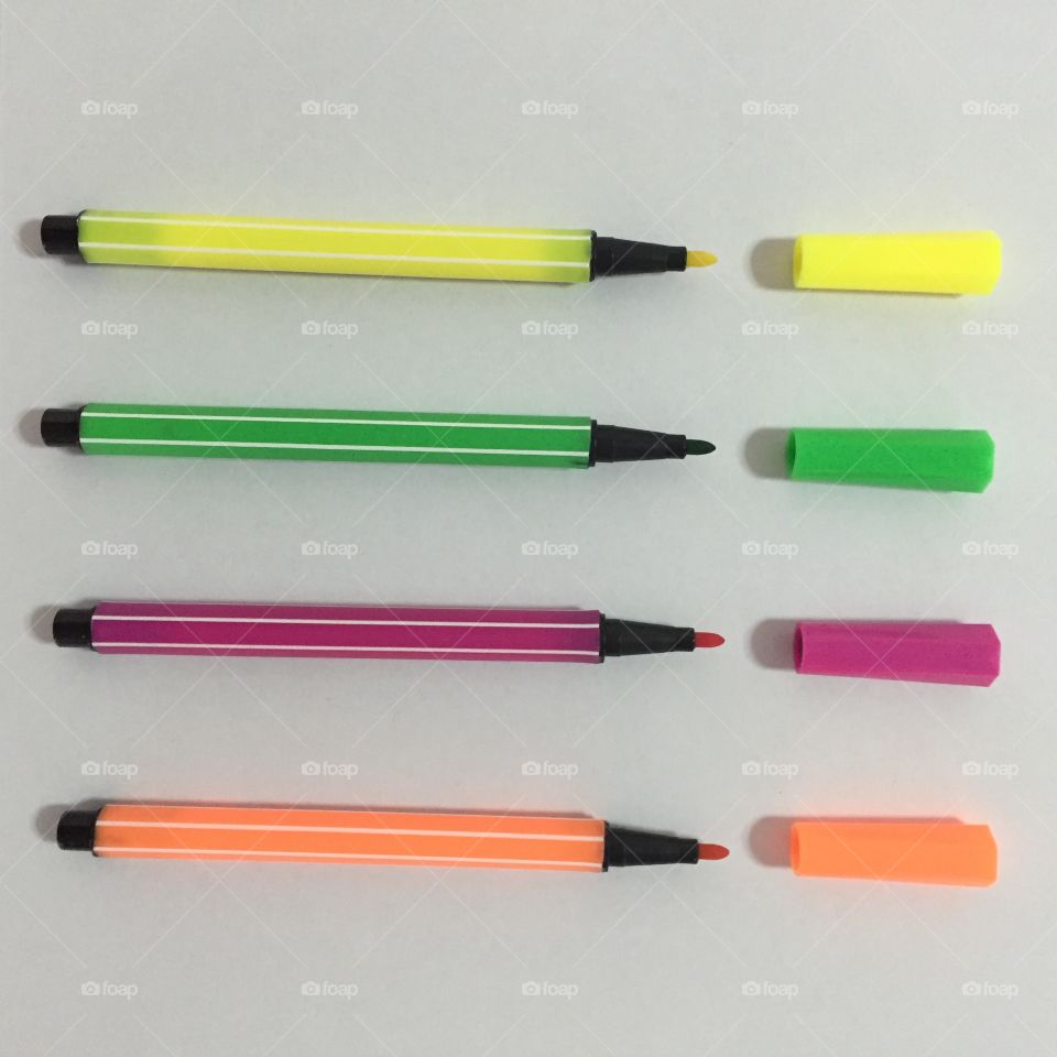 Colored markers on the white background great for any use.