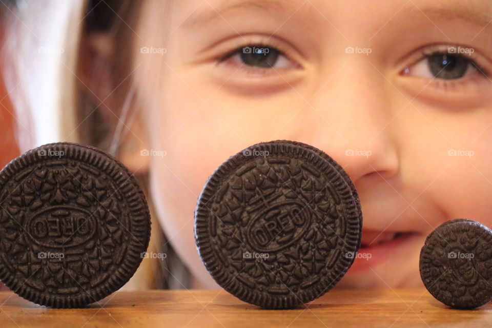 Oreo -Smile for Oreos. This little lady is happy to be eating Oreos. 