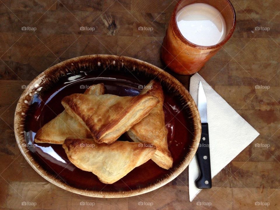 Hot Raspberry turnovers with glass milk, ready to eat!