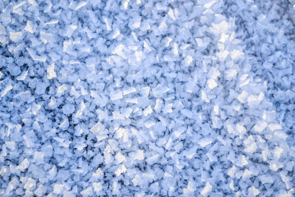 Snow crystals on the ground