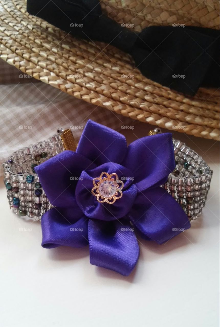 purple flower bracelet. Nature is my inspiration! This handmade bracelet is very carefully weaved and has a mysterious look.