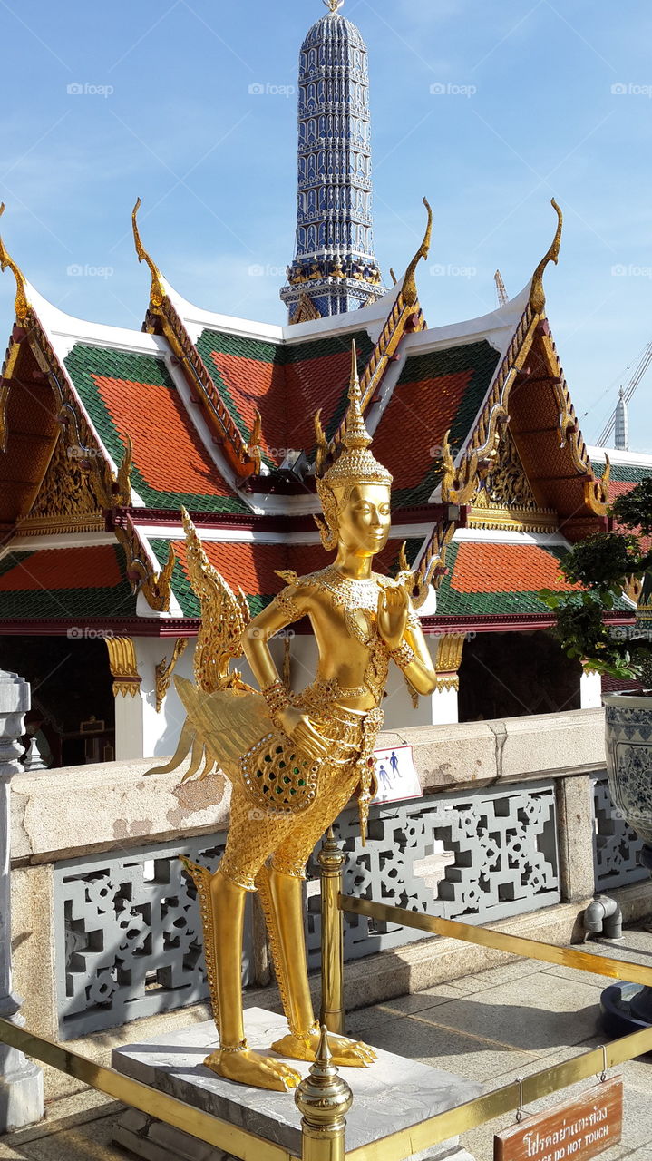 golden kinnara statue
