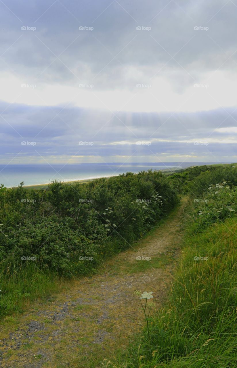 Sun beams Dorset coast