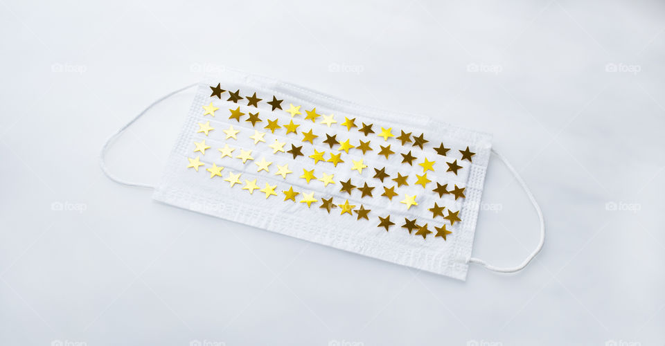 Face mask with golden stars 