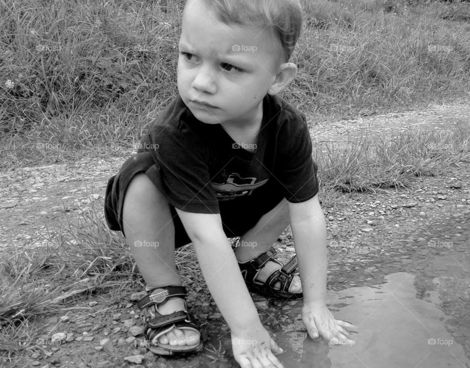 He looks sad but was actually mad at his sister.