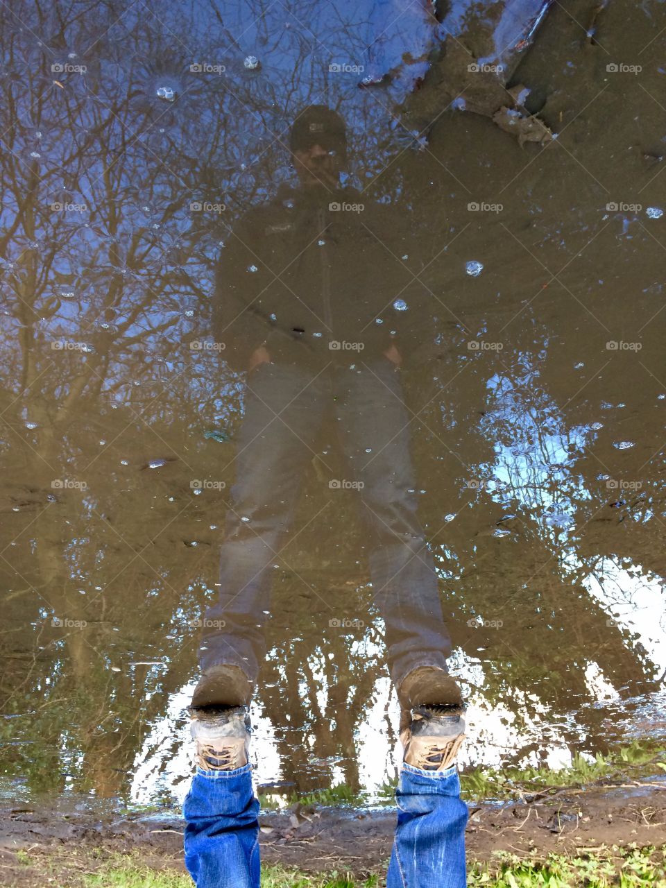 Man reflecting in water