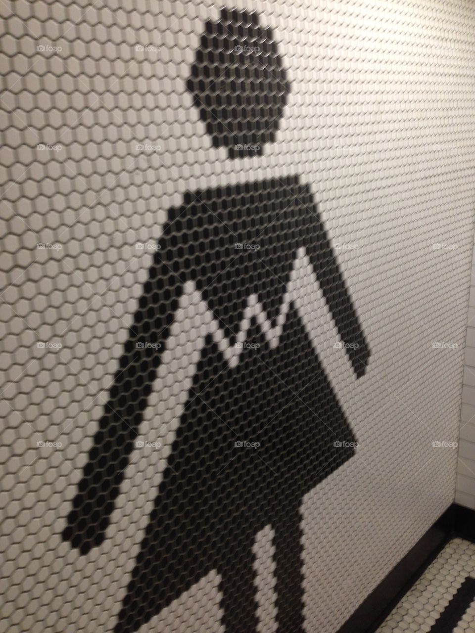 This restroom is for pointy-titted bra-less women