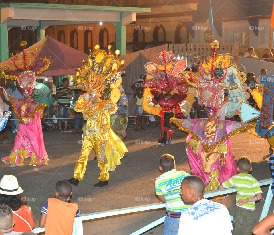 Cuba: Carnival! As I see Santiago de Cuba in black and white, and sometimes in color! Cuba is a special destination and people know how to enjoy themselves, despite obvious signs of poverty and hardships. The streets are filled with vibrant colors and rhythm and it is not uncommon to see people dancing in the streets and alleys to the sound of loud salsa music! Wish I could, but It's impossible to capture it all!