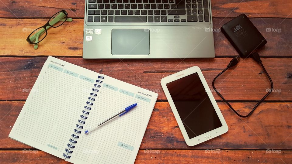 Laptop on a wooden desk