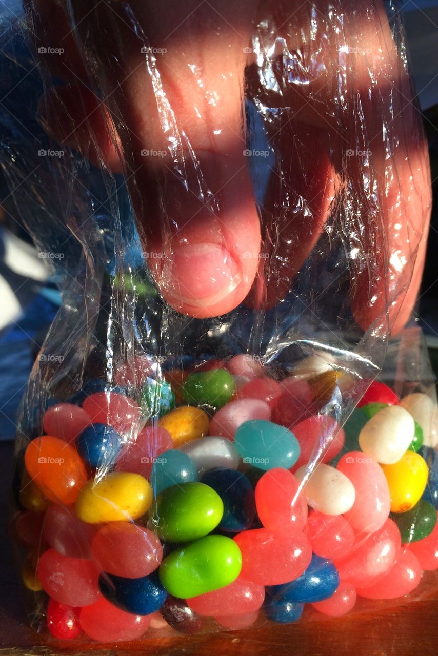 Hand in the jelly bean bag