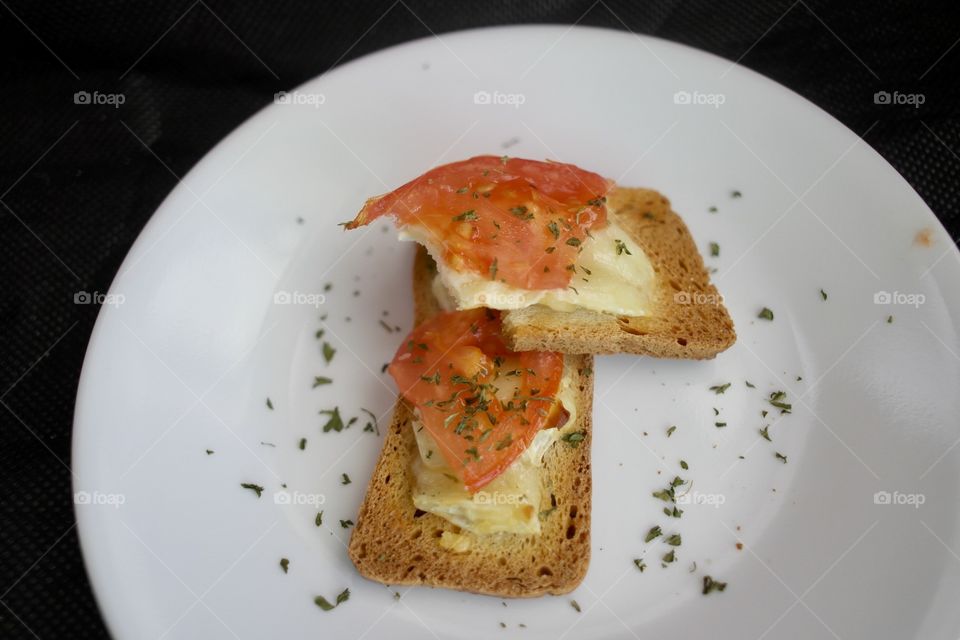 Tomato and cheese on toast 