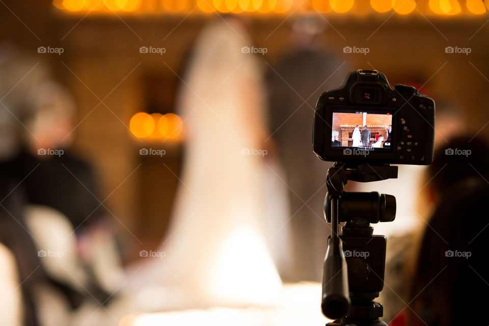 Selfies time - image of back of camera of bride and groom