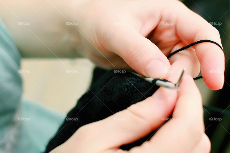 Close-up of women Crocheting