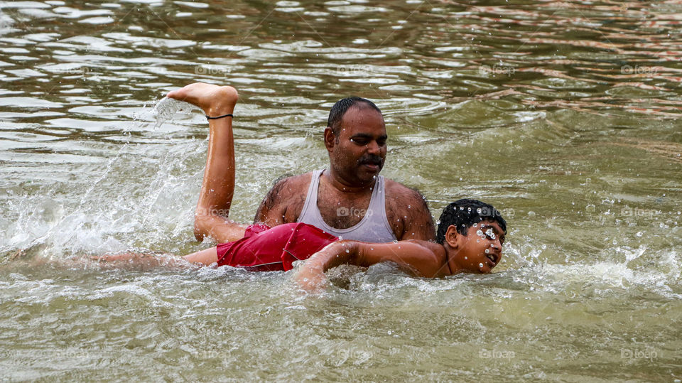 A Lovable story of indian father who care about his son's life , teached swimming himself in this summer...