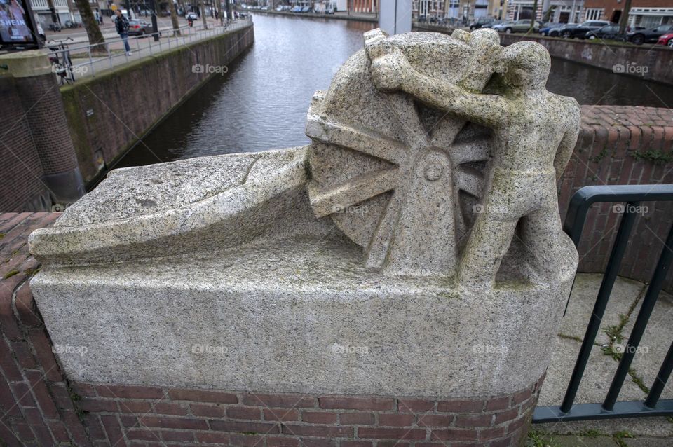 Statue On The Overtoomse Sluice Bridge At Amsterdam The Netherlands 29-3-2023