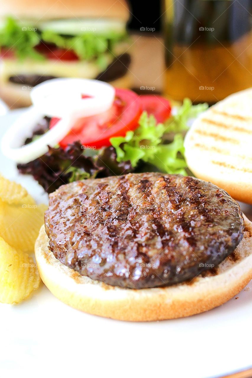 Delicious fresh grilled hamburger on bun