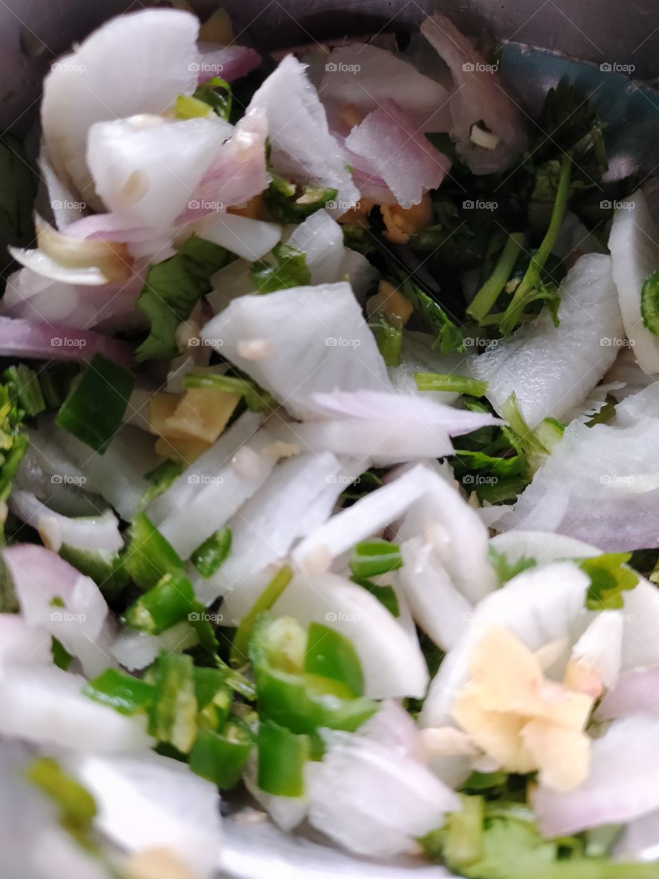 Mixture on reddish,green chillies,onion,ginger, coriander.