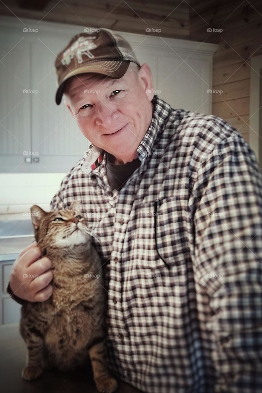 A Happy Father & his cat