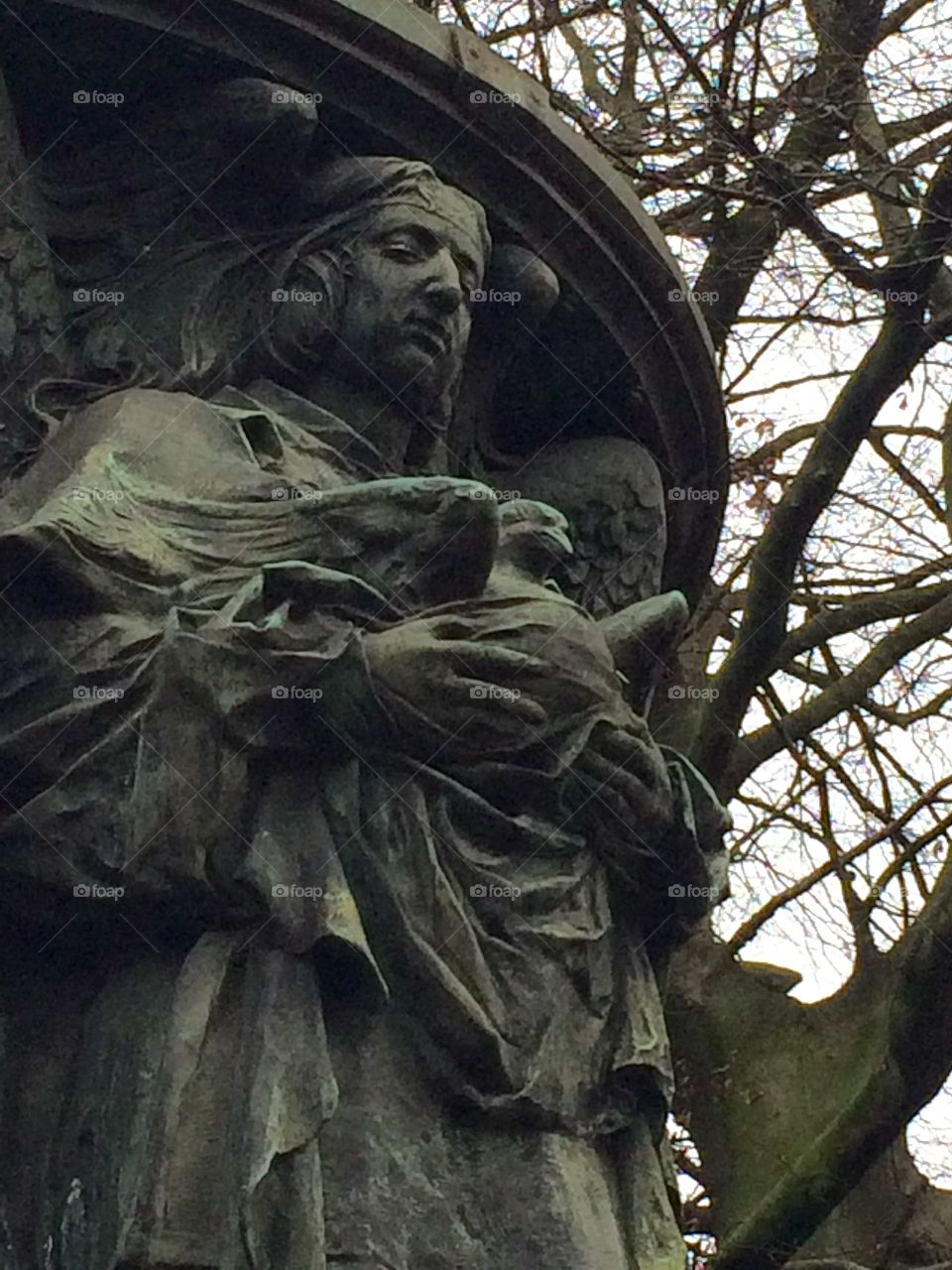 Angel statue in a belgian park.