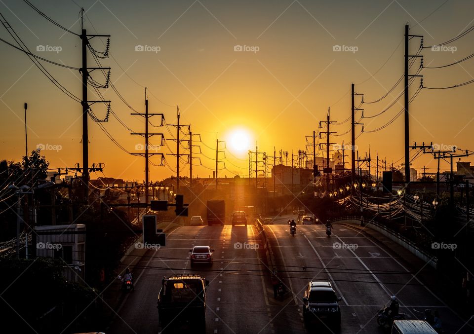 Relax moment when Beautiful sunrise shine on the road ,Bangkok Thailand