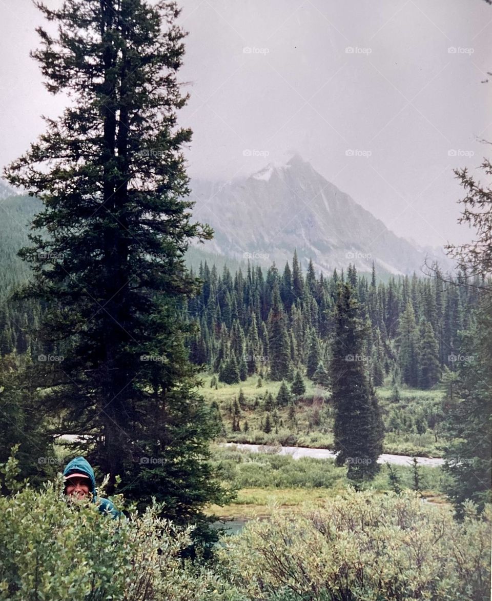 A man hiding in the bushes on the Johnston Canyon Ink Pot trail.