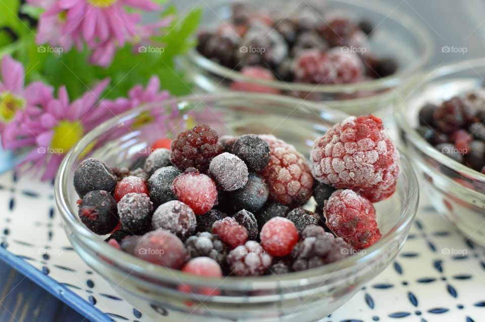 bowl of berries with ice