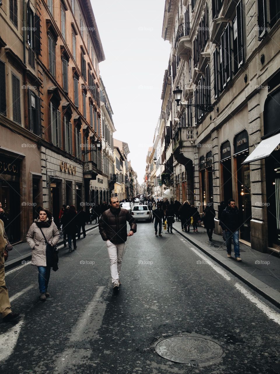  A Runway Made of Concrete. People walking full of fashion in Rome's most luxurious street, Via dei Condotti. 