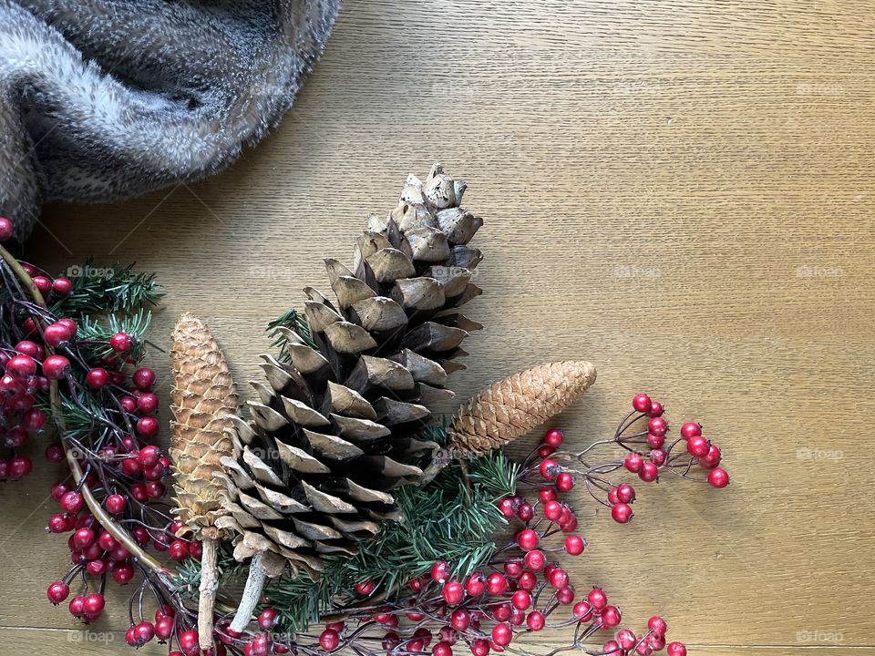 Christmas Pine Cones, Berries, Fur Blanket, and Greenery