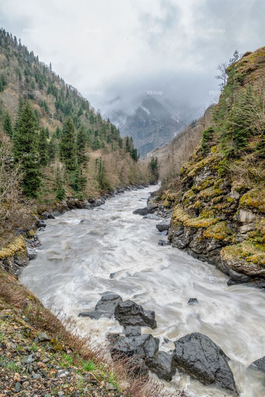 River run through beautiful mountain scape