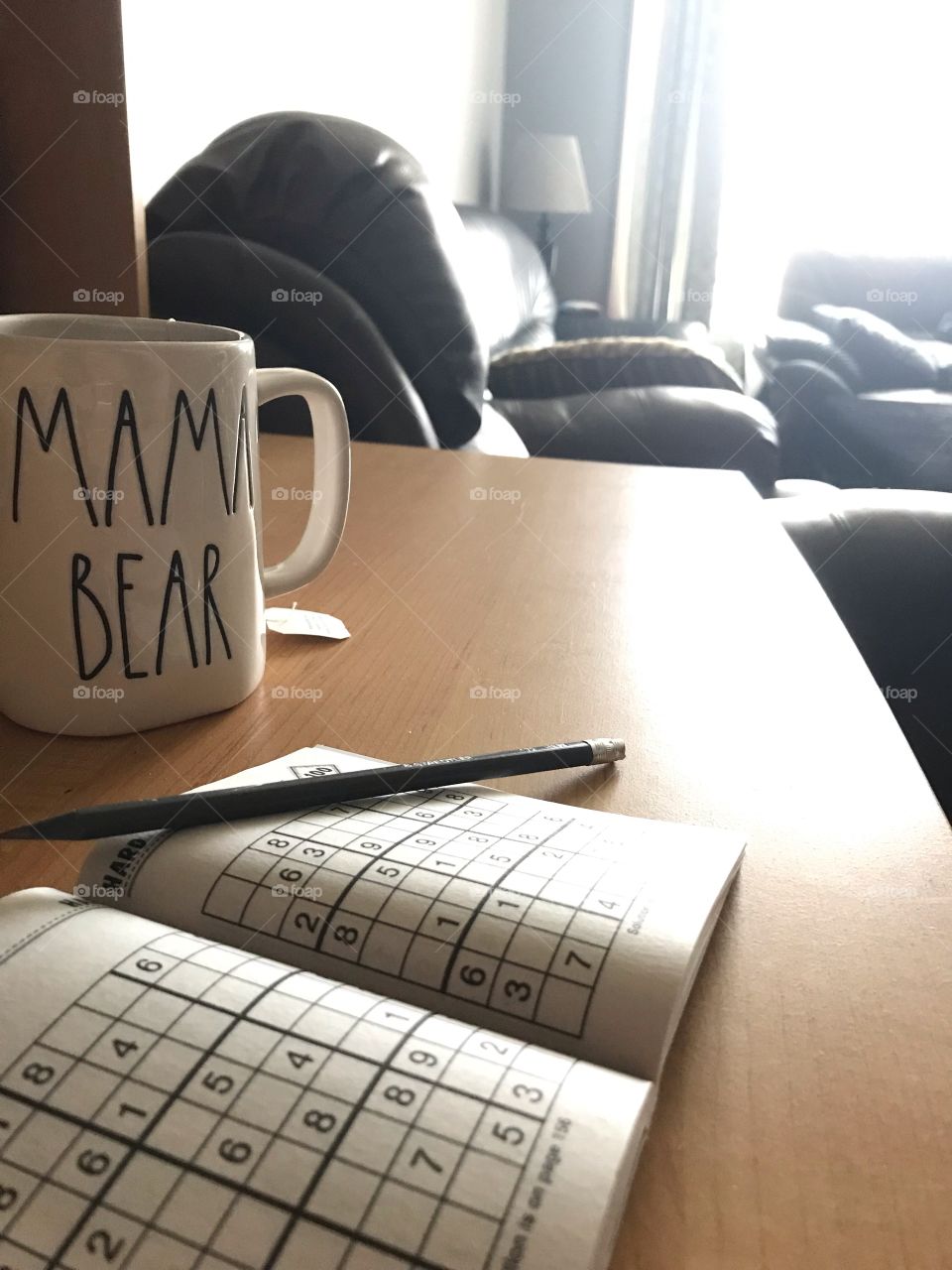 Drinking tea and playing sudoku