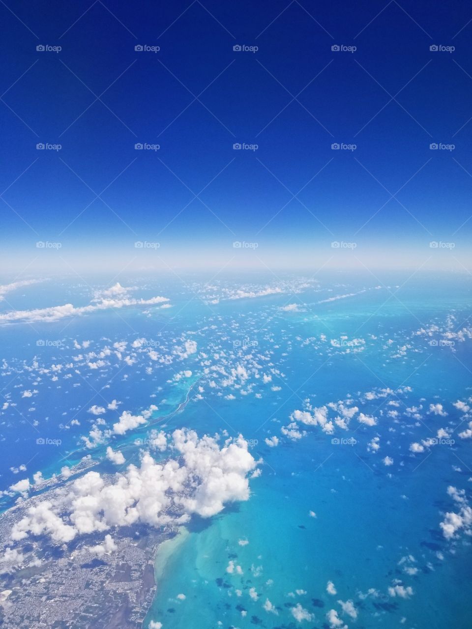 Earth. .Looking down at the beautiful Bahamas✈