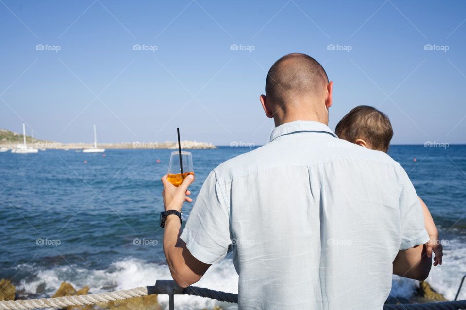 relax watching the sea with dad