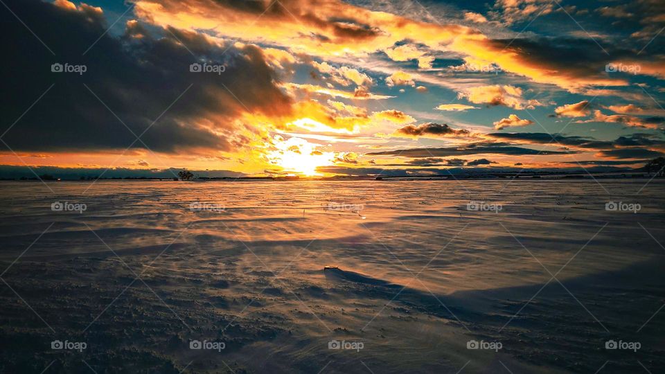 Snow drift with the warm gaze of the sun.