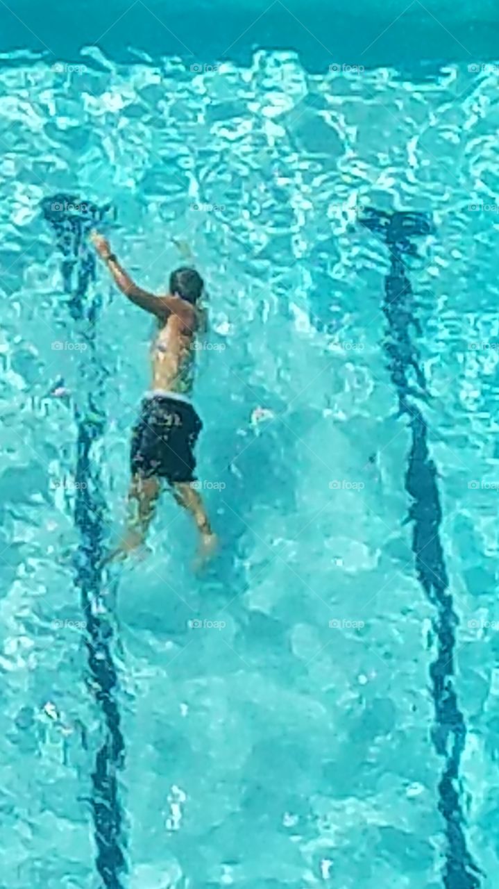 Swimmer Doing Laps in Pool