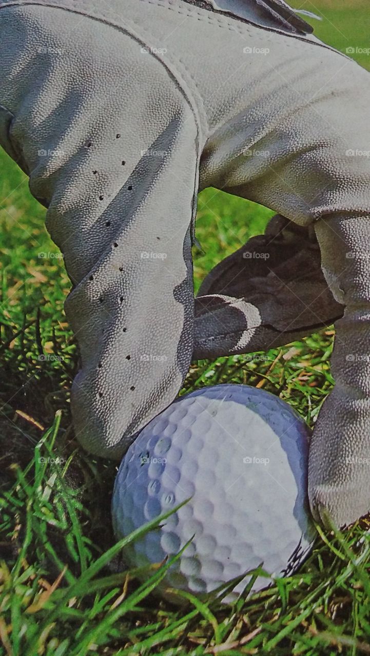 a beutiful wallpaper in this picture.a golf ball there in the picture you can use this for your wallpaper